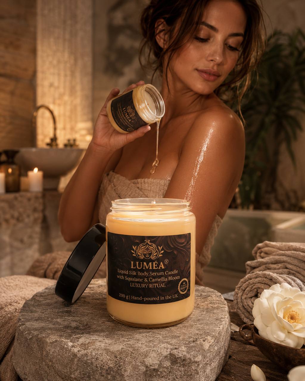 LUMÉA London Liquid Silk Body Serum Candle in a luxury spa setting with a woman applying warm body oil, featuring squalane and camellia bloom